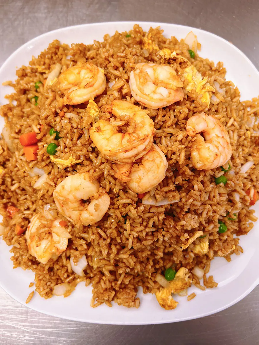 Plate of shrimp fried rice at Eggroll Inn，a American Chinese Restaurant in Balch Springs